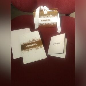 CHANEL Elegant Mini Gold and White Paper Gift Bag with Cards.